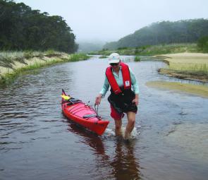The lower reaches of the Thurra River are shallow and kayaks need to be dragged upstream.